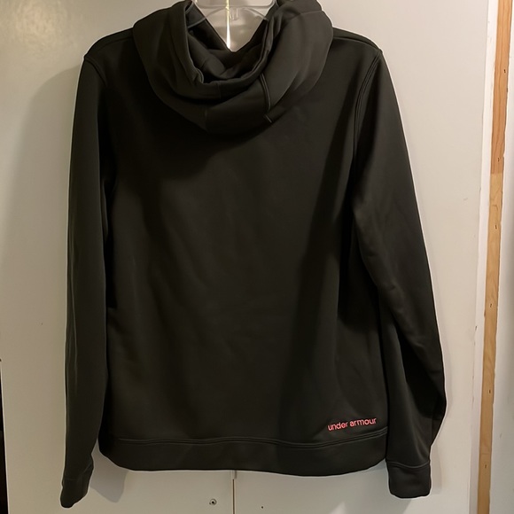 In new condition, under armor olive green with pink camo size large. - Picture 2 of 4